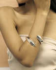 Girl wearing statement bracelet silver jewelry bracelet big silver bracelet