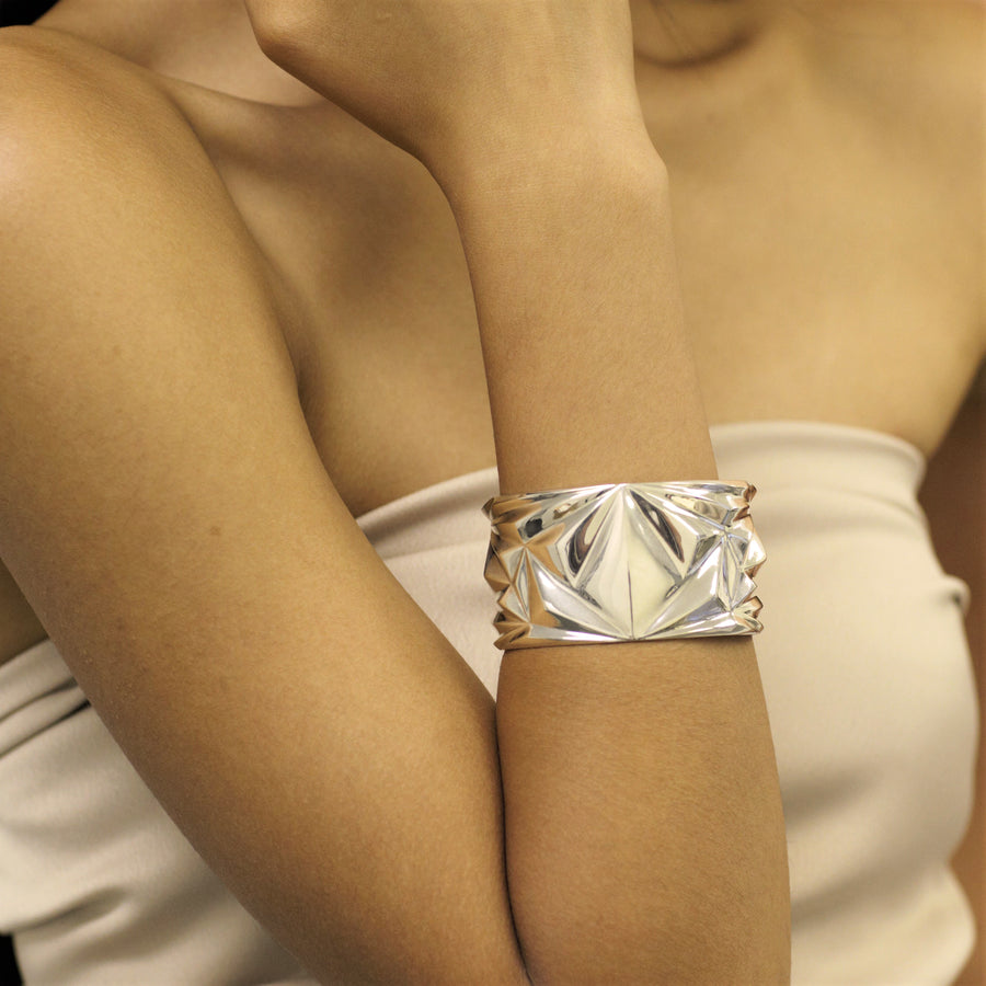 front view of girl wearing a cuff bracelet bold cocktail unisex jewelery montreal made silver bena jewelry montreal edgy jewelry design montreal little italy jeweler custom made silver jewels creation