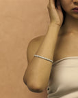 Girl wearing bangle bracelet bena jewelry montreal custom made jewelry unisex fine jewlery montreal handmade in canada silver litte italy jeweler