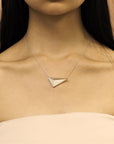 Girl wearing statement sterling silver pendant 