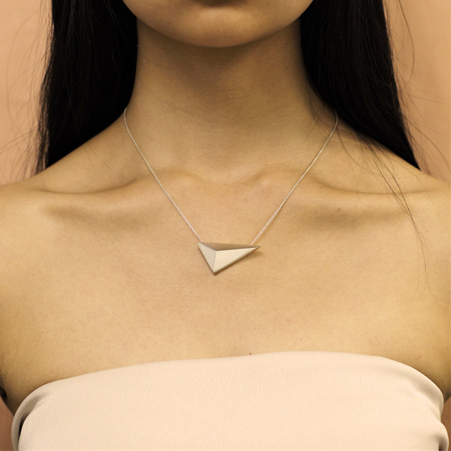 Girl wearing statement sterling silver pendant 