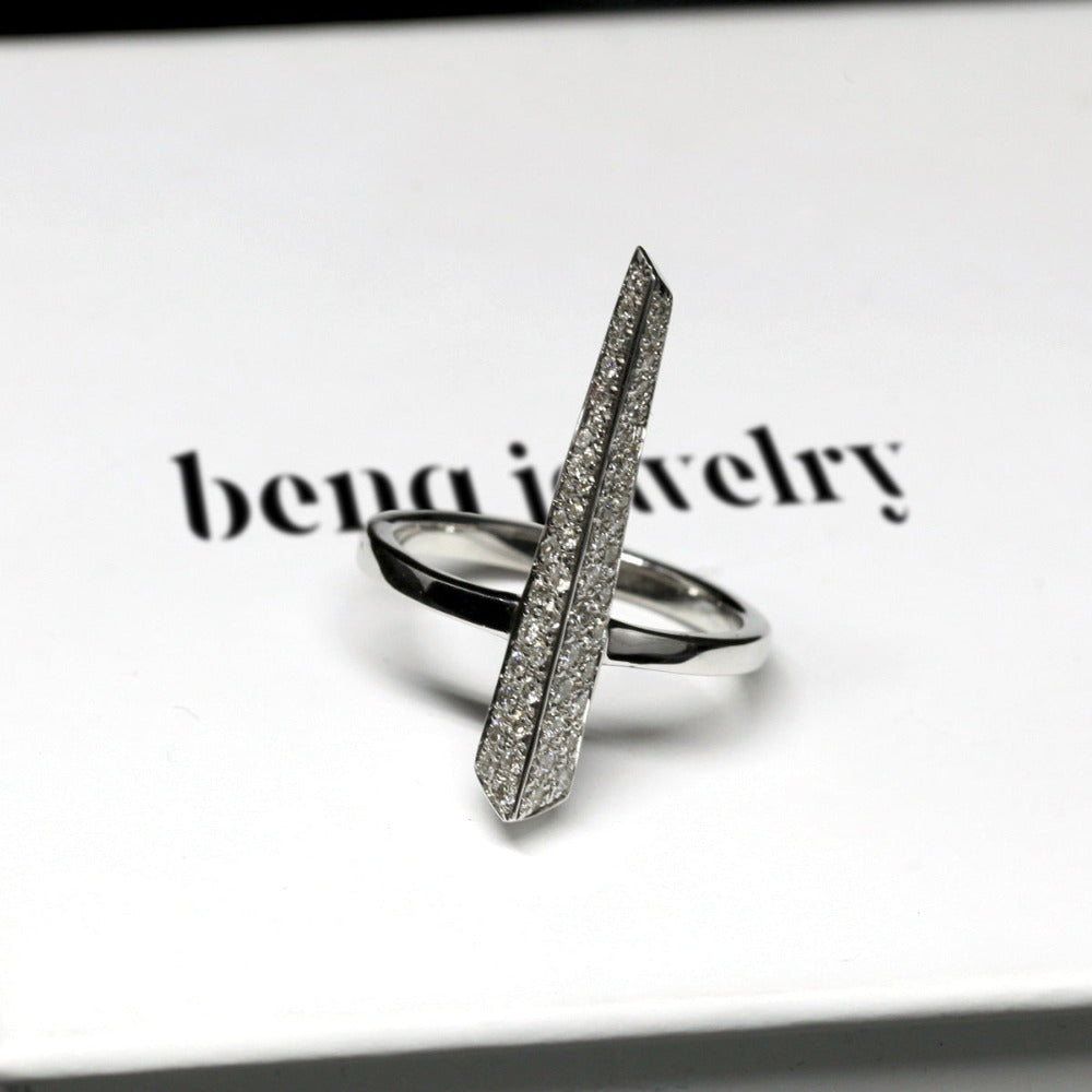 Close-up of Diamond Pike Ring&#39;s intricate pavé work and significant gold volume, part of the Fancy Edgy collection.