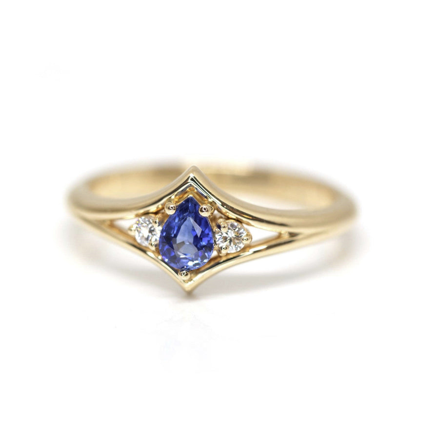 pear shape yellow gold ring with two diamonds custom made in montreal
