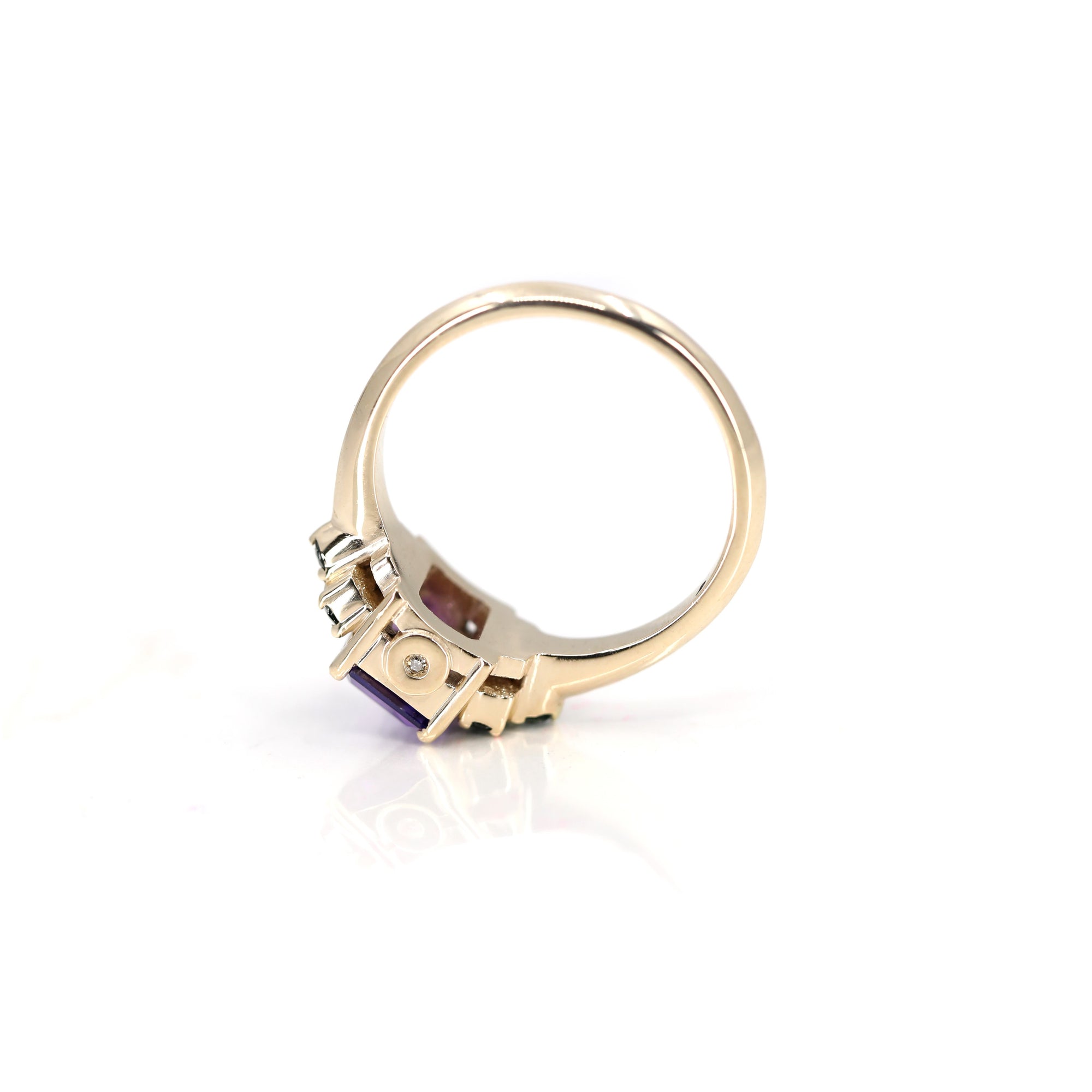 Side view on white background: Highlights the interplay of silver and gold in the band’s design, emphasizing the unique craftsmanship of this custom piece.