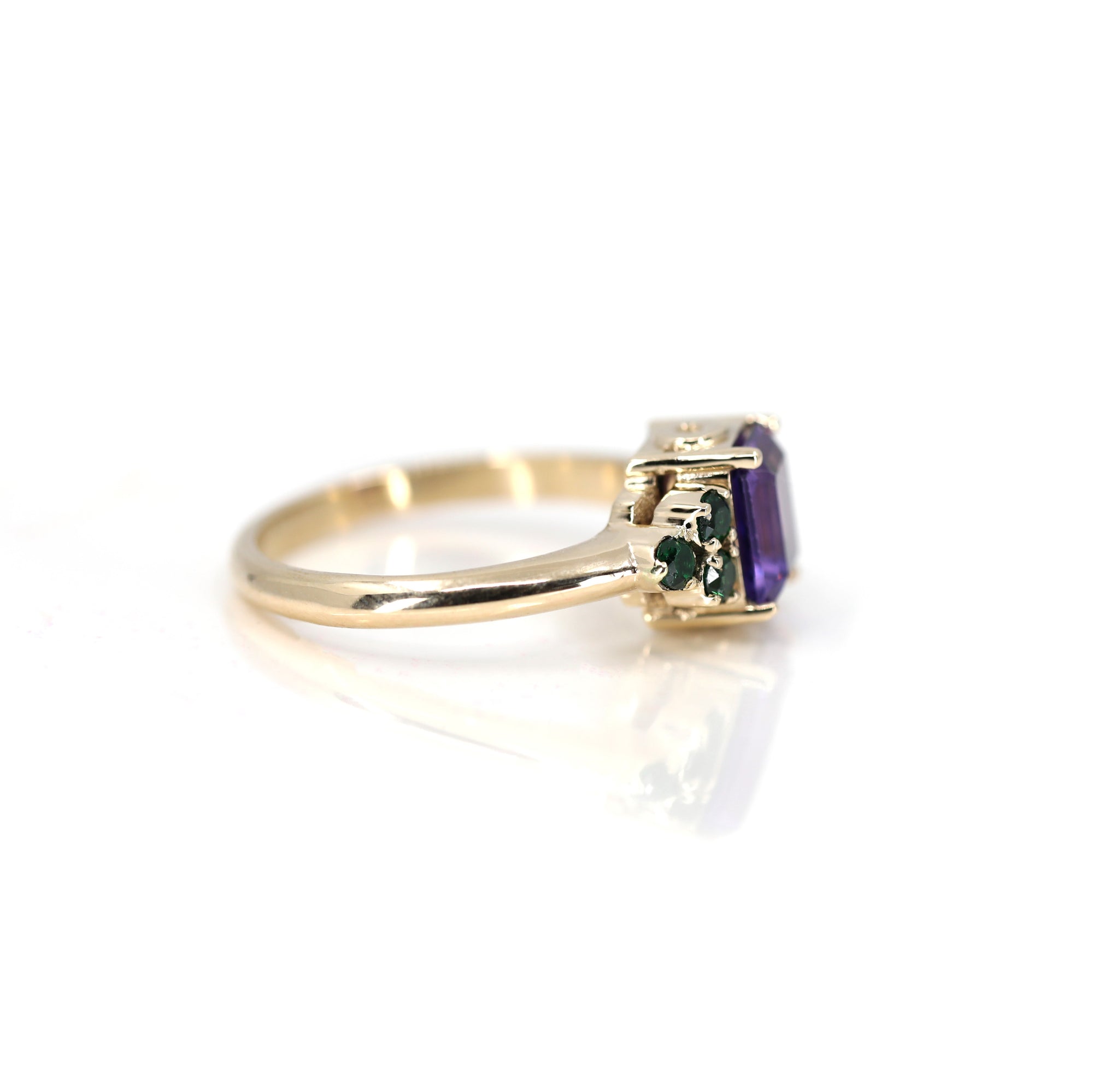 Side view on white background: Displays the sturdy band and meticulous finish of the Amethyst Cocktail Ring.