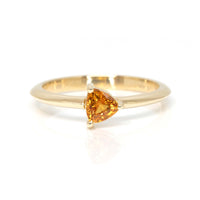 orange sapphire trillion shape yellow gold bridal ring made in montreal by bena jewelry designer on a white background