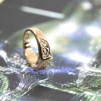 bena jewelry men Chiseled vermeil gold edgy ring made in montreal on a dark mutli color background