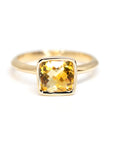cushion citrine bezel setting yellow gold ring by bena jewelry designer in montreal on white background