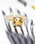cushion citrine yellow gold designer made in montreal statement ring on a muti color background
