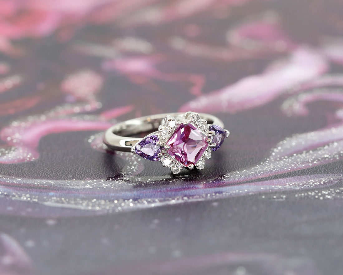 cusotm made purple sapphire ring custom made platinium ring with purple trillion gems and diamond bridal ring on multi color background