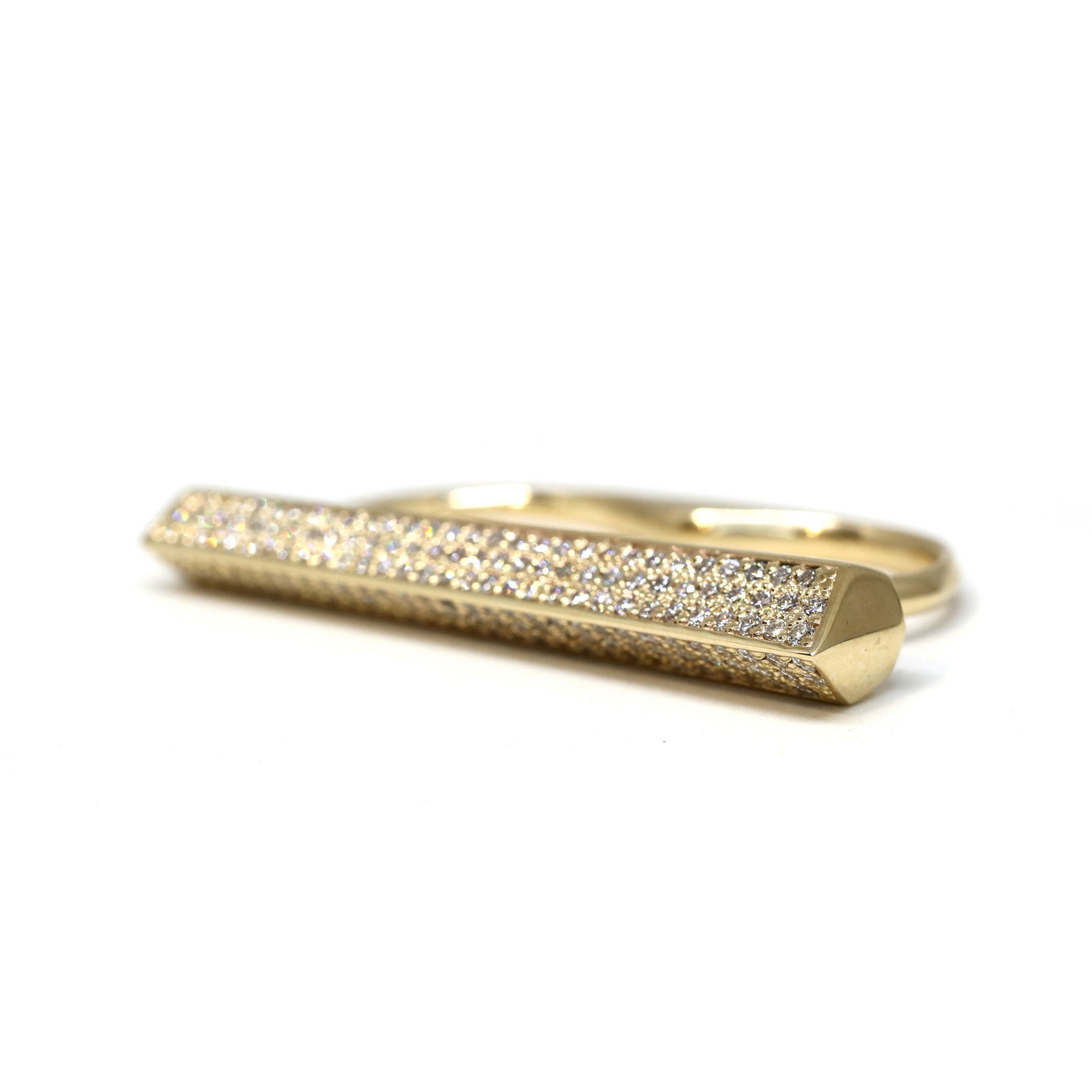 Close-up of the ring, highlighting the brilliance of the lab-grown diamonds and the smooth gold finish. The Diamond Punch Ring is made in Canada, by Bena Jewelry.