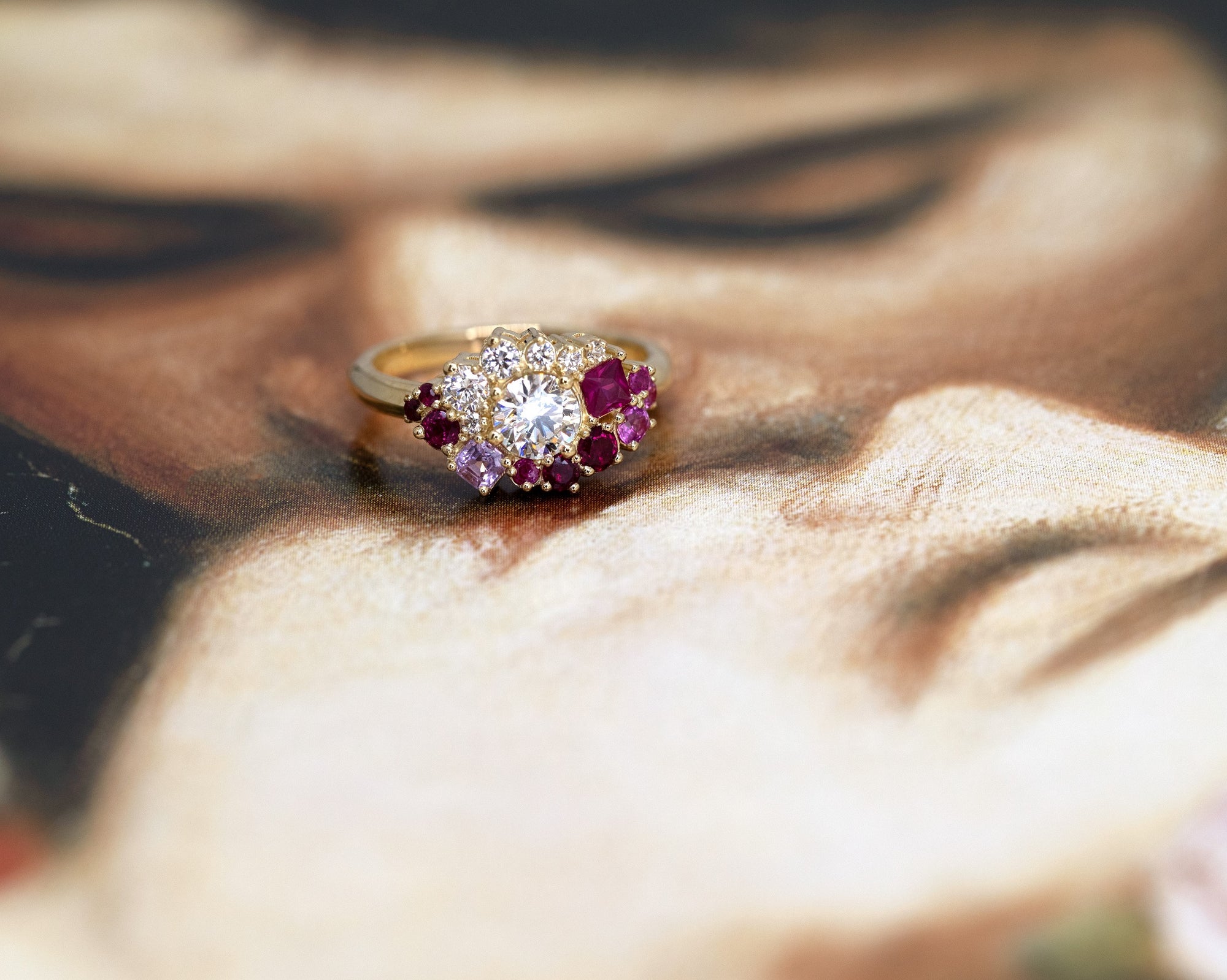 round diamond ruby designer ring montreal custom made colored gemstone engagement ring bena jewelry designer on multi color background