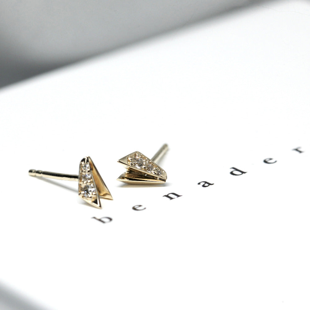 Yellow gold diamond earrings with a sleek and edgy style, crafted by Canadian designer Bena Jewelry.