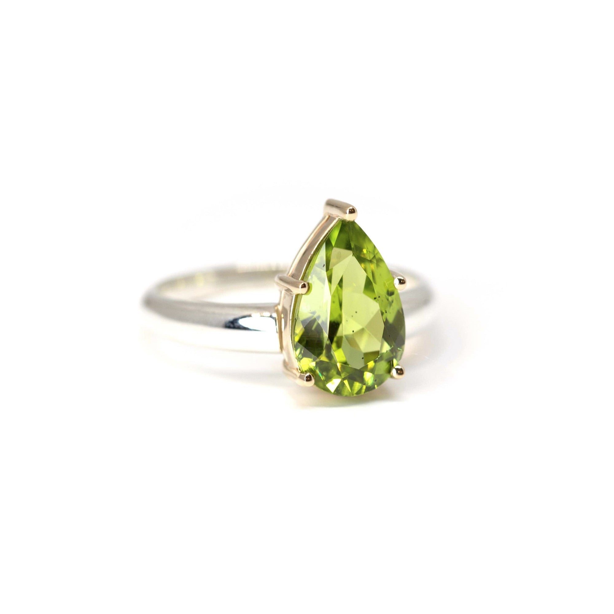Side view of peridot ring – The bold pear-shaped peridot catches the light beautifully in this unique statement ring.