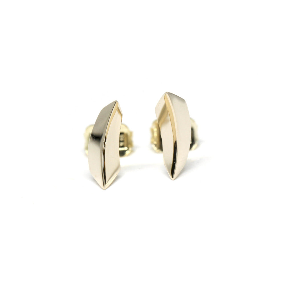 Yellow gold Brace Studs by Bena Jewelry, a Montreal-based independent designer. Modern fine jewelry with bold, minimalist details.