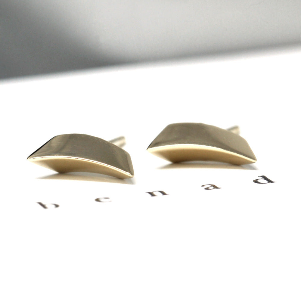 Sleek and sharp yellow gold earrings featuring an edgy design, crafted in Montreal by a fine jewelry designer.