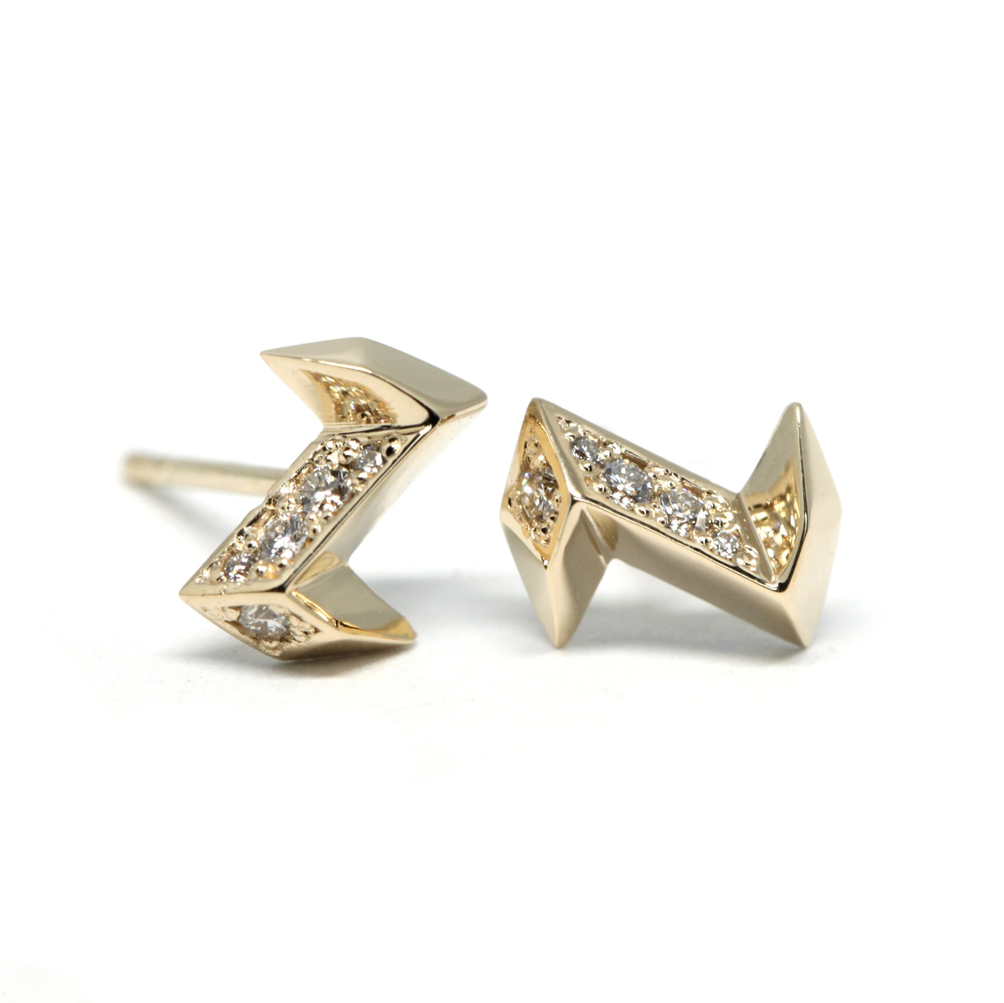 Electric Diamond Studs in diamond pavé, bold contemporary earrings in electric shape, made by Bena Jewelry, Montreal.