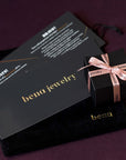bena jewelry black jewelry box packaging on bordeau background