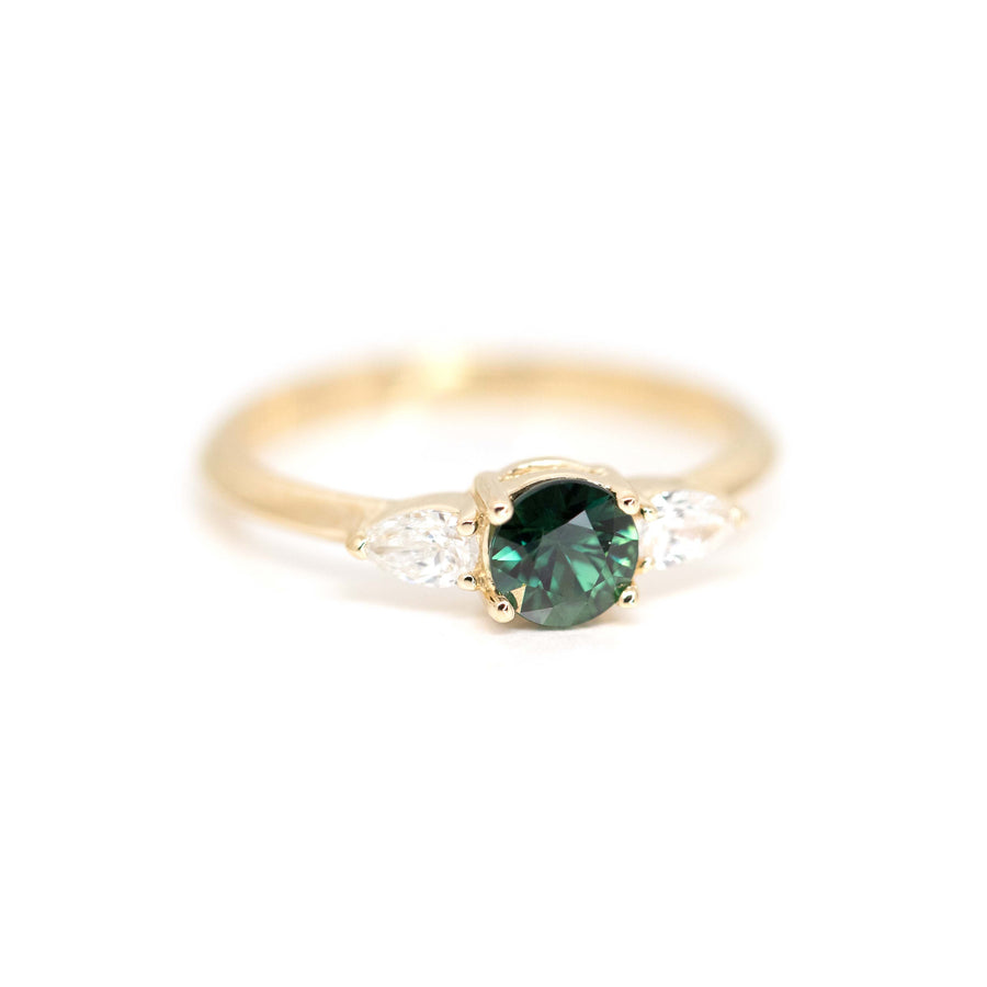 pear shape diamond and greenish blue sapphire bena jewelry designer montreal