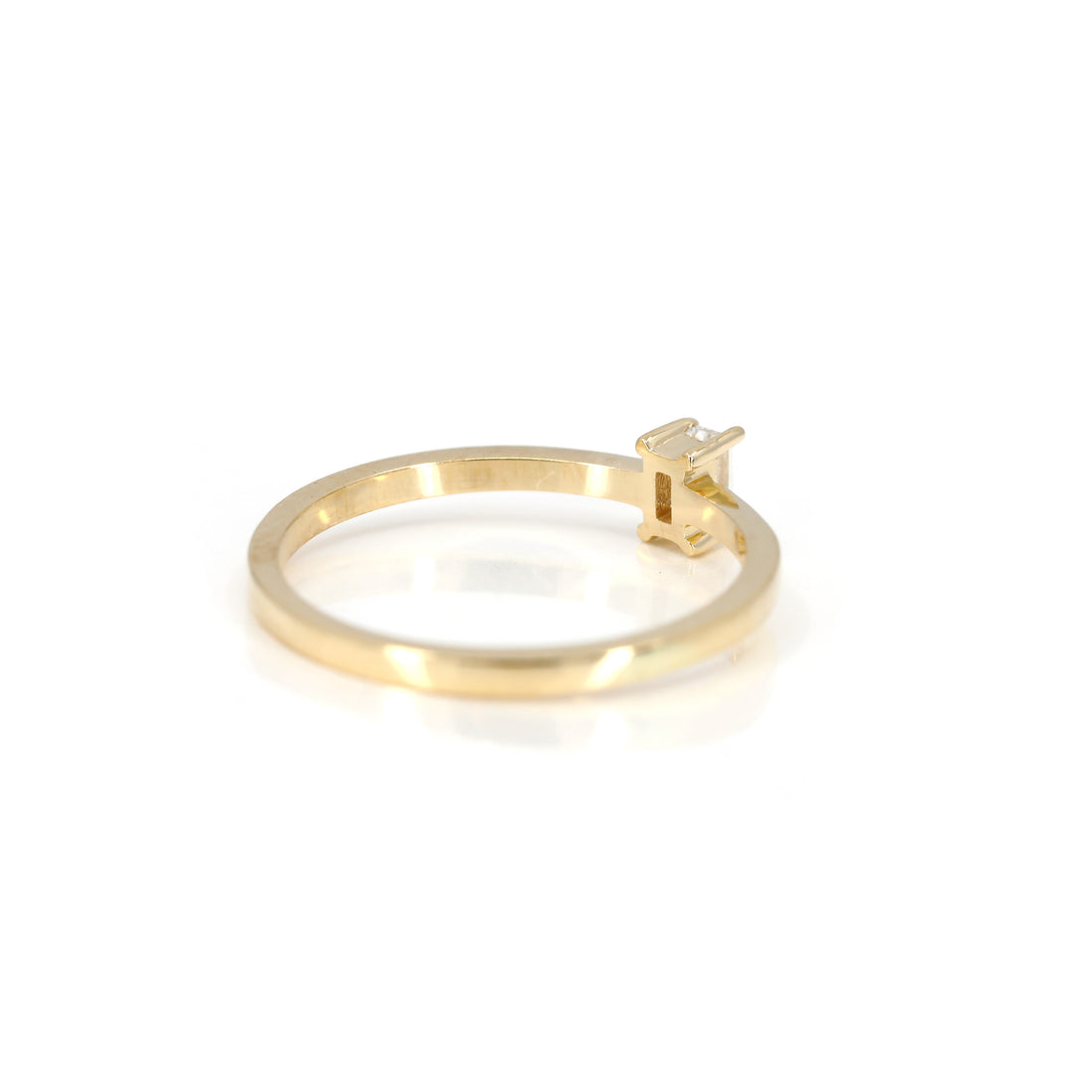 back view of a boxy yellow gold wedding band custom made in montreal by bena jewelry designer on white background