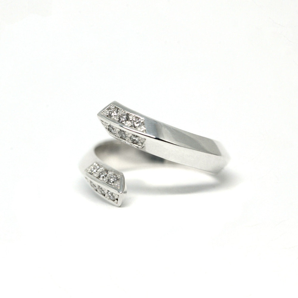 Contemporary open band in white gold, adorned with diamonds, crafted in Canada by Bena Jewelry.
