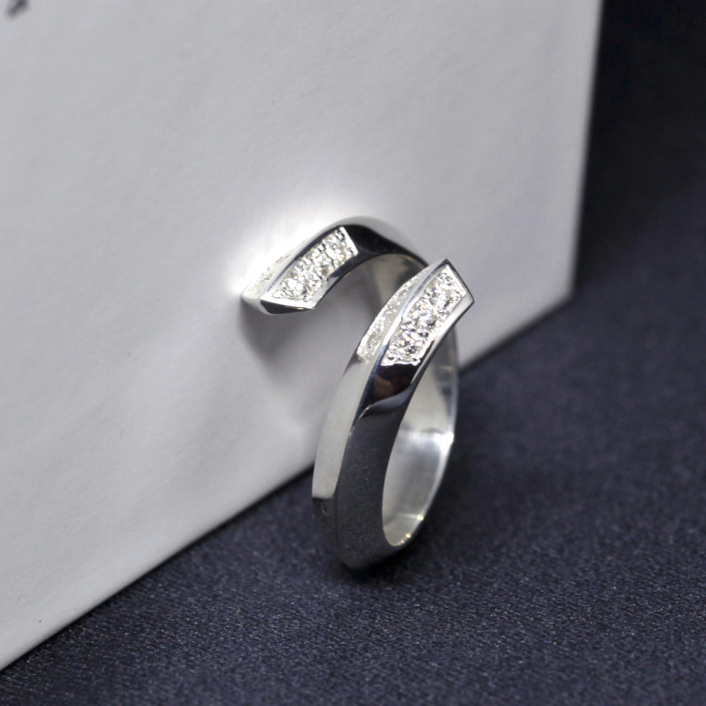 Side view of White Gold Diamond Loop Band from the Fancy Edgy collection, featuring a striking curved design.