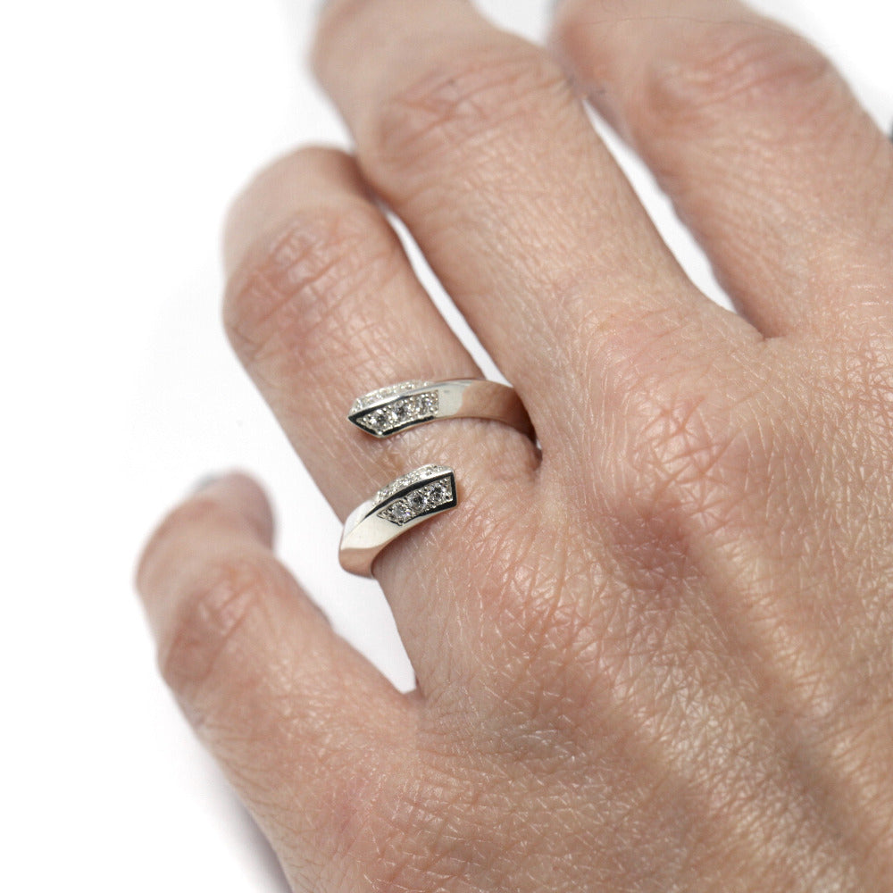 Girl wearing Open white gold band with diamonds, a contemporary design by Canadian fine jewelry designer Bena Jewelry.