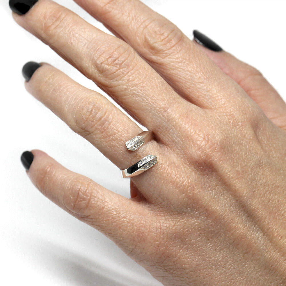 Elegant Diamond Loop Band with sparkling diamonds, worn by a girl. Made in Montreal by Bena Jewelry.