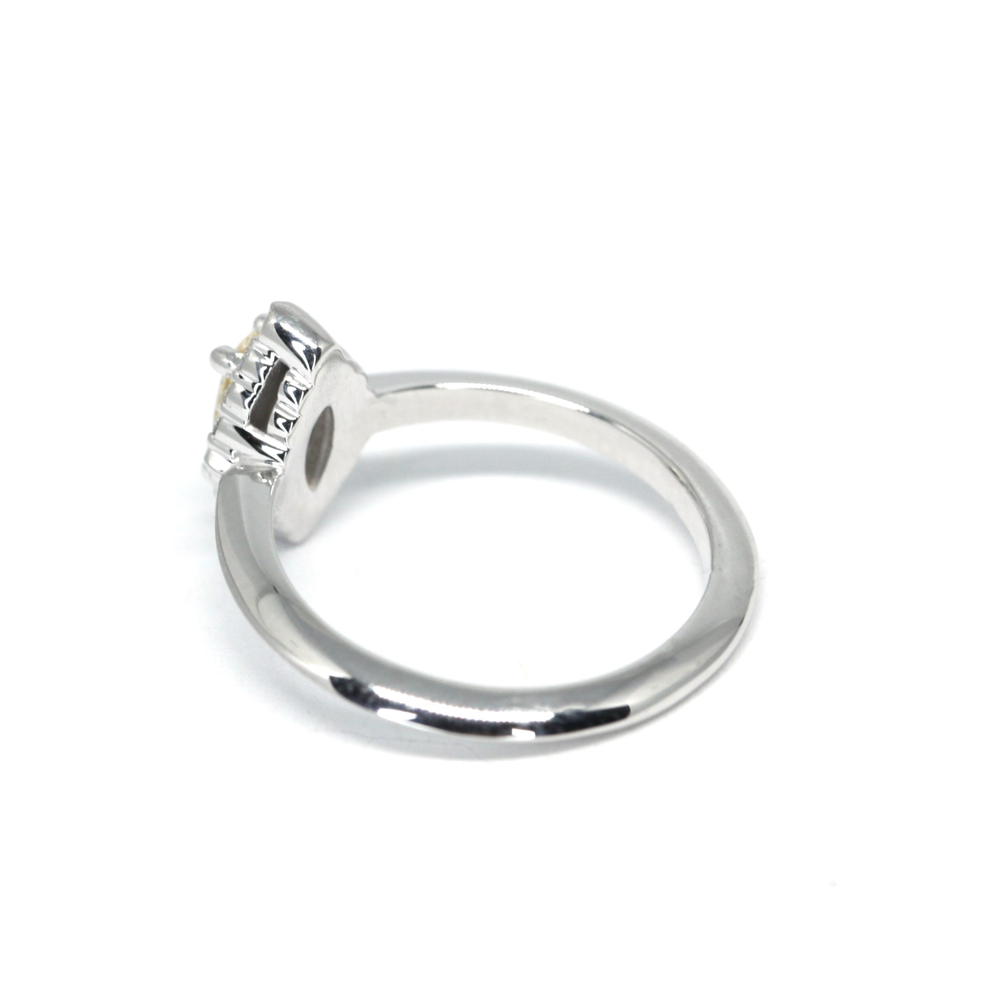 Back view of the Aura Ring, highlighting the brilliance of its halo diamonds and fine craftsmanship by Bena Jewelry, Montreal.
