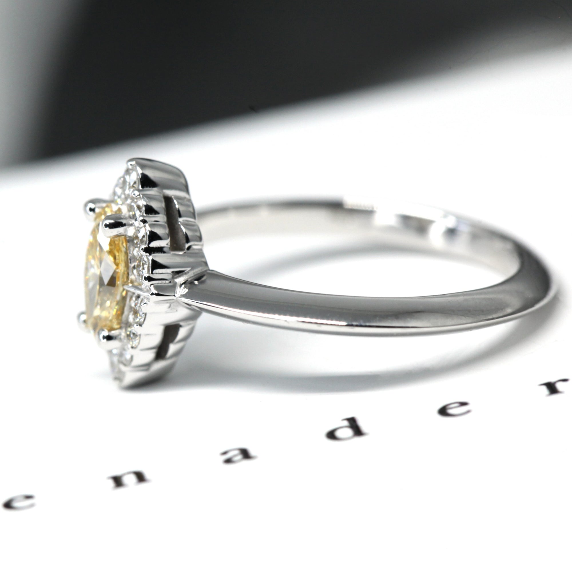 Side view of bena jewelry edgy marquise shape yellow diamond white gold ring montreal made in canada color gemstone bridal jewels minimalist modern design fine gems GIA certified natural gemstone made in montreal