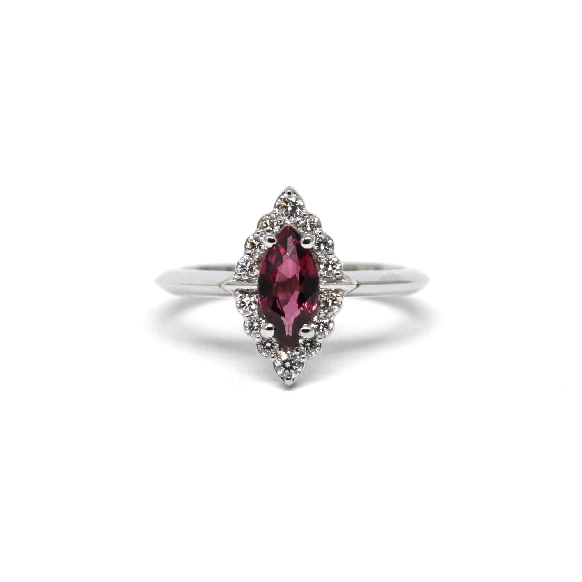 Front view of maquise shape rhodolite natural red garnet gemstone with small white diamonds montreal made in canada fine edgy bridal jewelry signature designer custom made montreal little italy handmade jewelry montreal designer