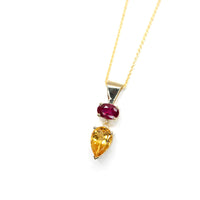 oval shape ruby and pear citrine gold pendant custom made fine jewellery at boutique ruby mardi on a white background