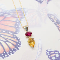oval shape ruby and pear shape citrine gold pendant colored gemstone jewelry made in montreal