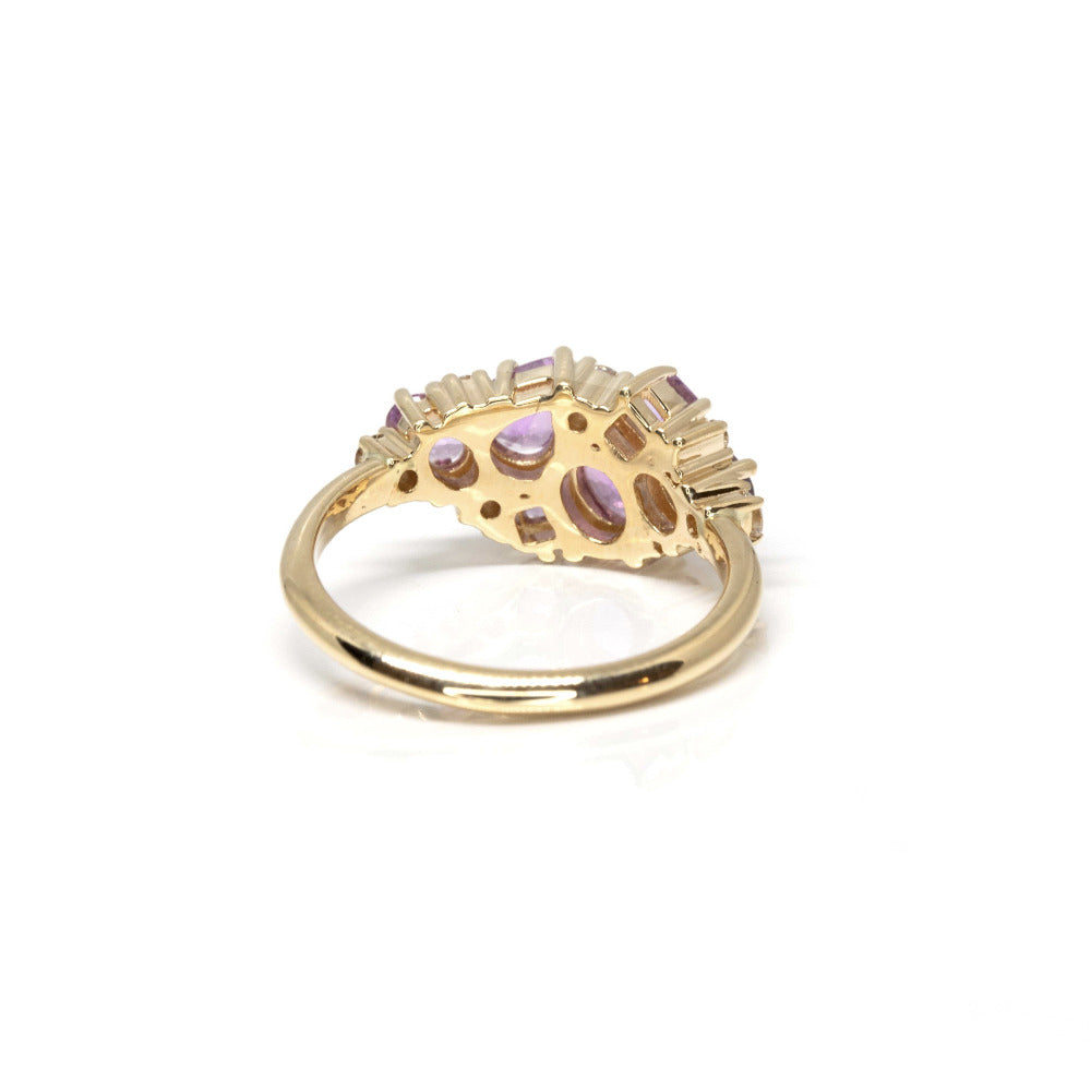 Back view: Reveals the secure gemstone settings and the fine craftsmanship of the yellow gold band. Designed by Bena Jewelry in Montreal, Canada.