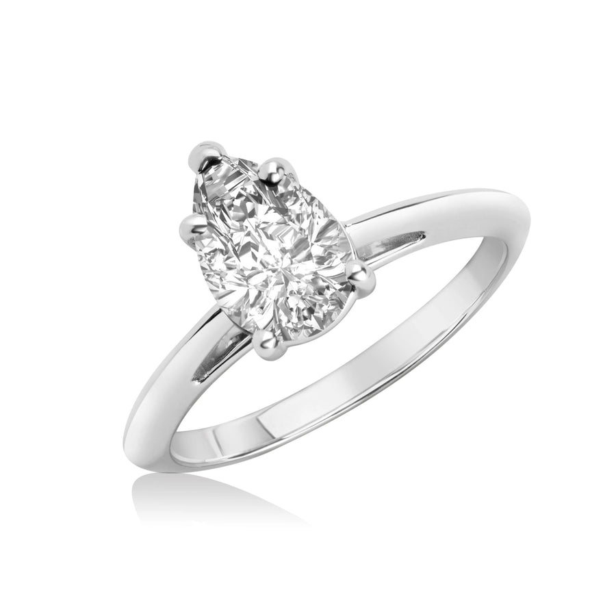 Side view of pear shape engagement ring montreal made in canada bridal jewelry pear shape icy diamond handmade in montreal bridal ring custom made diamond jewelry montreal