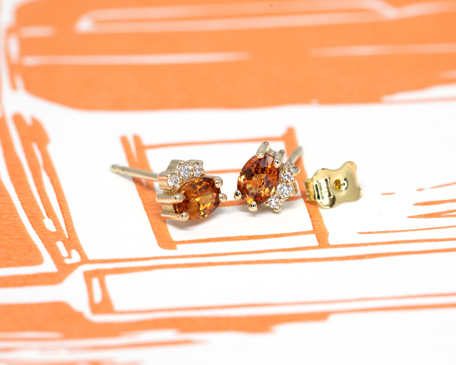 oval shape spessartite garnet diamond earrings bena jewelry canada designer
