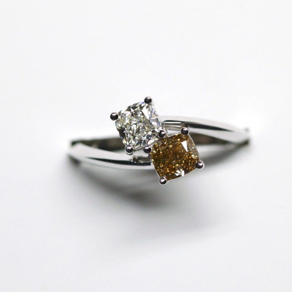 Close-up of diamond ring – A modern engagement ring with two natural diamonds, symbolizing unity and love.