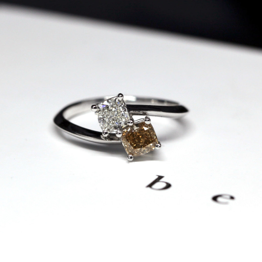Angled shot of diamond engagement ring – A custom-made wedding ring blending classic elegance with a modern edge.
