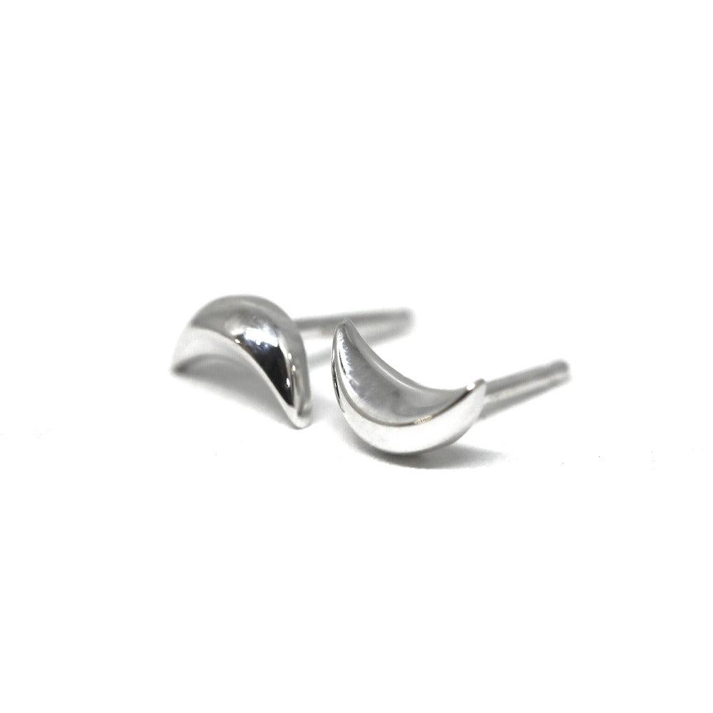 Petite white gold moon-shaped studs by Bena Jewelry, contemporary and elegant, showcased on a clean white background.