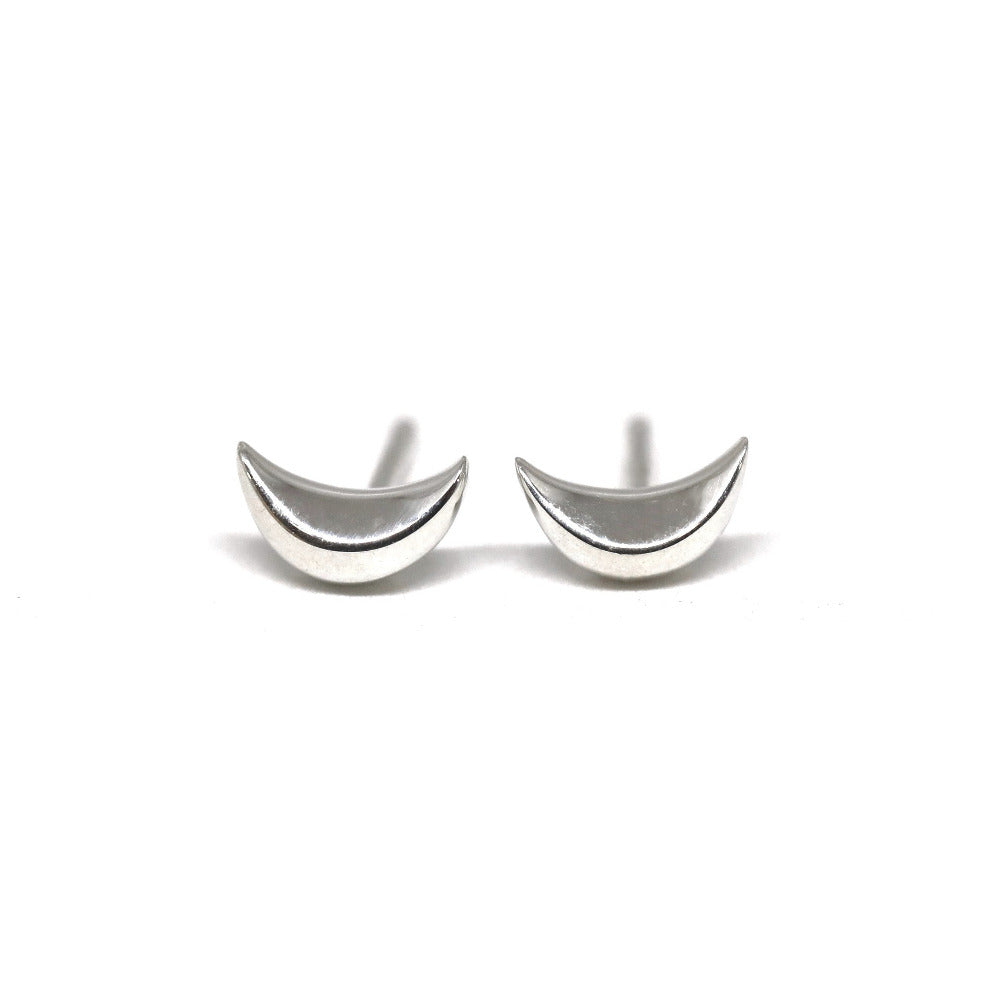 Minimalist white gold crescent earrings by Bena Jewelry, unisex design, photographed on a white background. Made in Canada.