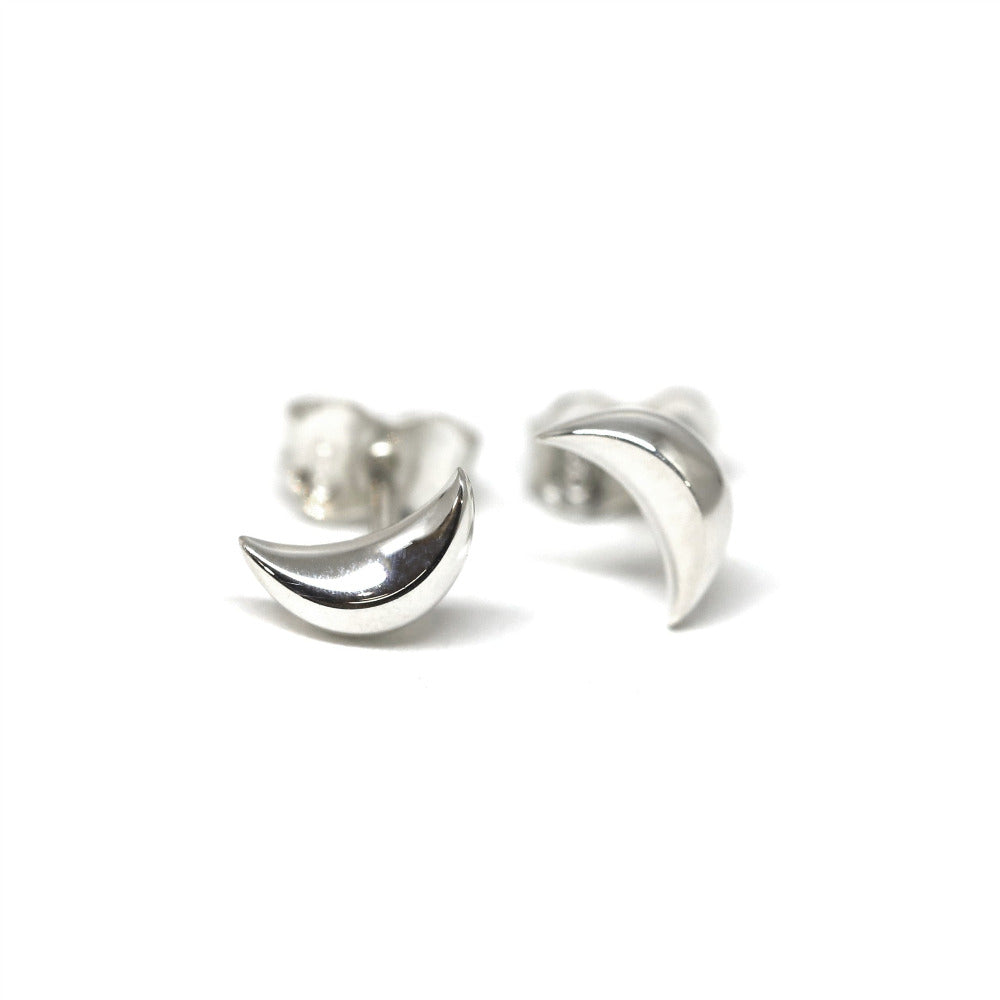 White gold moon stud earrings, sleek and modern design by Bena Jewelry, featured on a white background. Perfect for everyday wear, handmade in Canada.