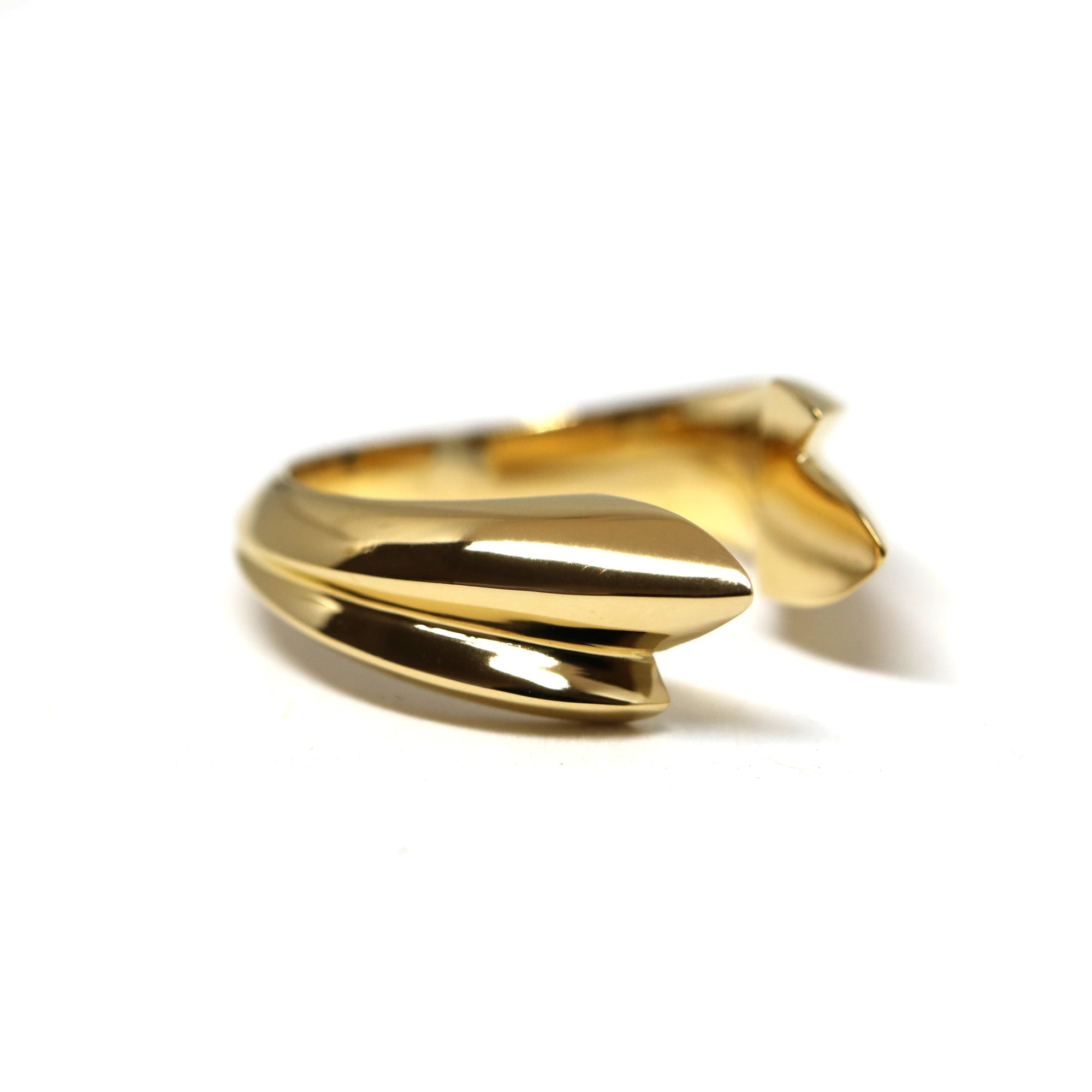 Tidal Ring in Yellow Gold on white background – A bold and modern sculptural gold ring, handcrafted by Bena Jewelry in Montreal.