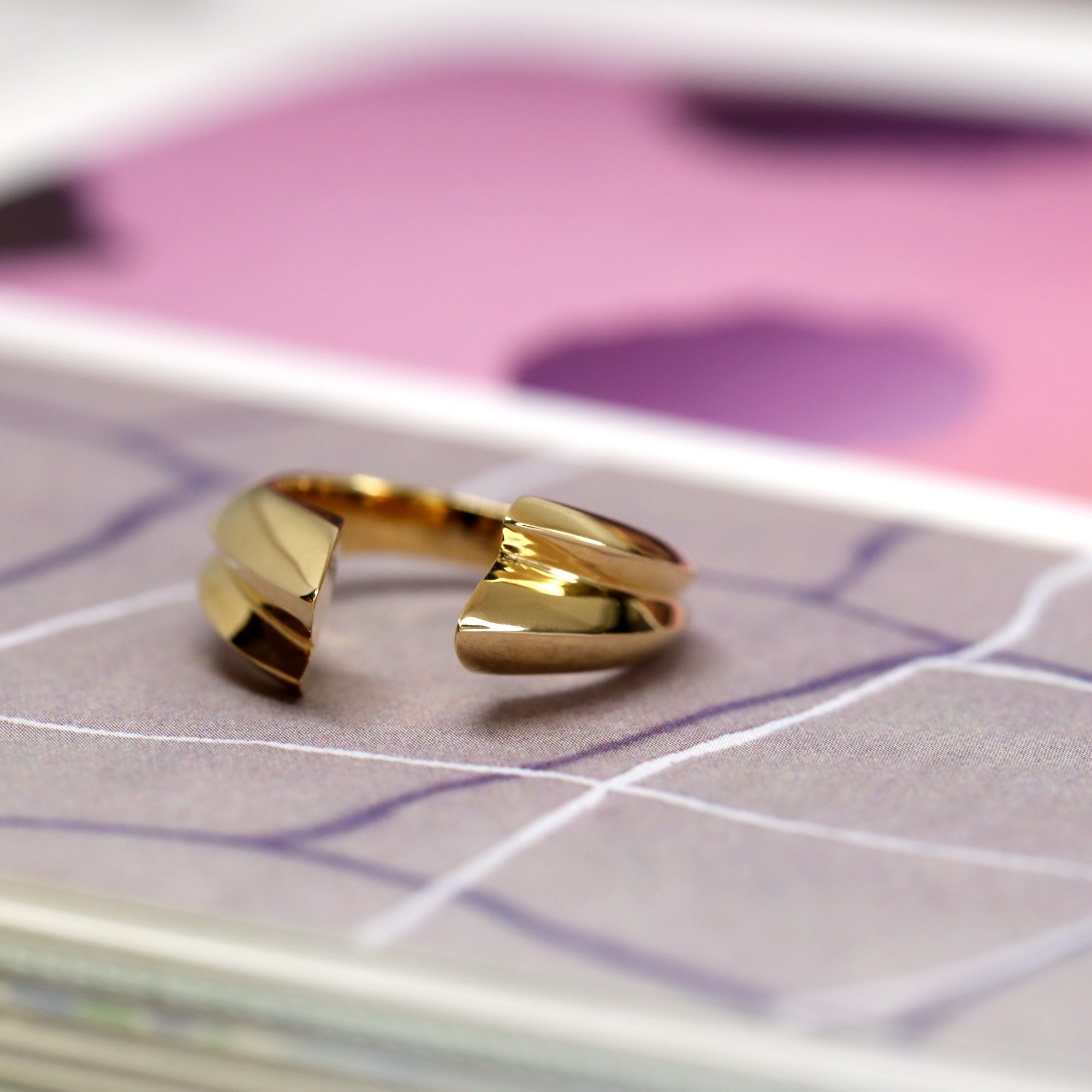 Macro shot of Tidal Ring in Yellow Gold – A highly detailed close-up highlighting the polished curves and craftsmanship.